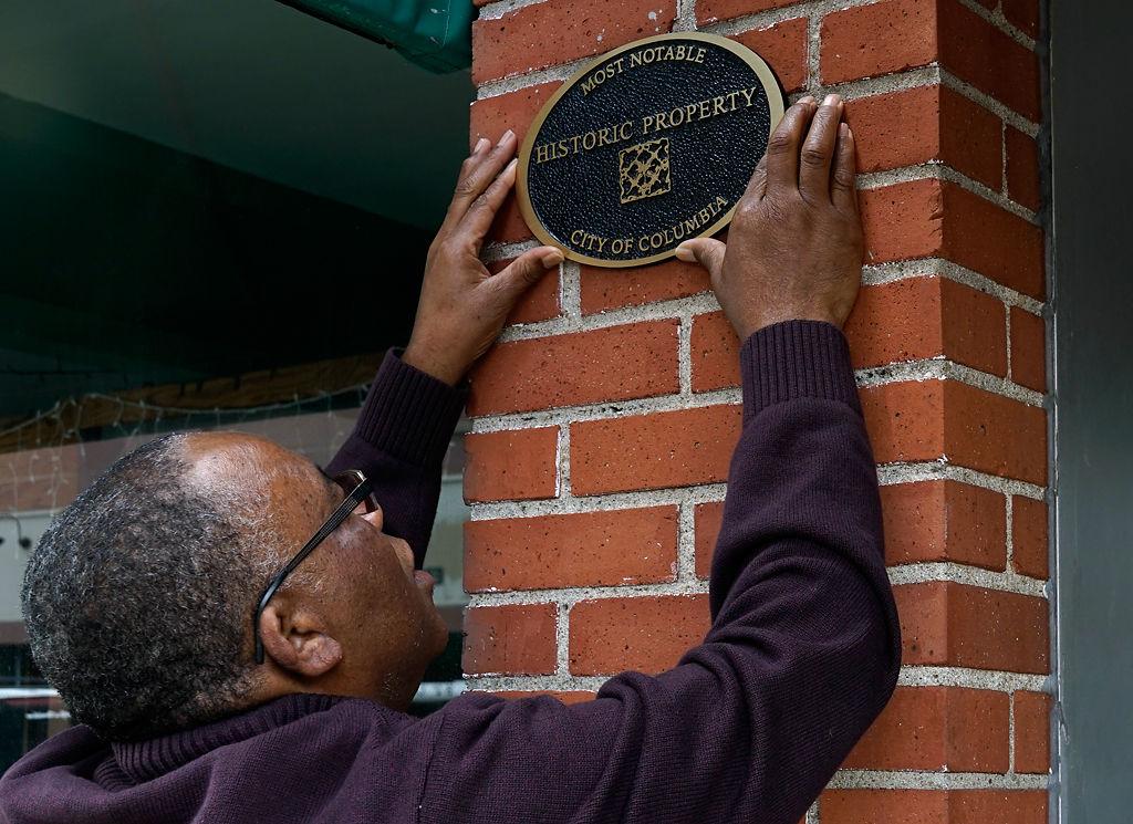 Ed Tibbs shows the spot where he plans to place the new historical property plaque